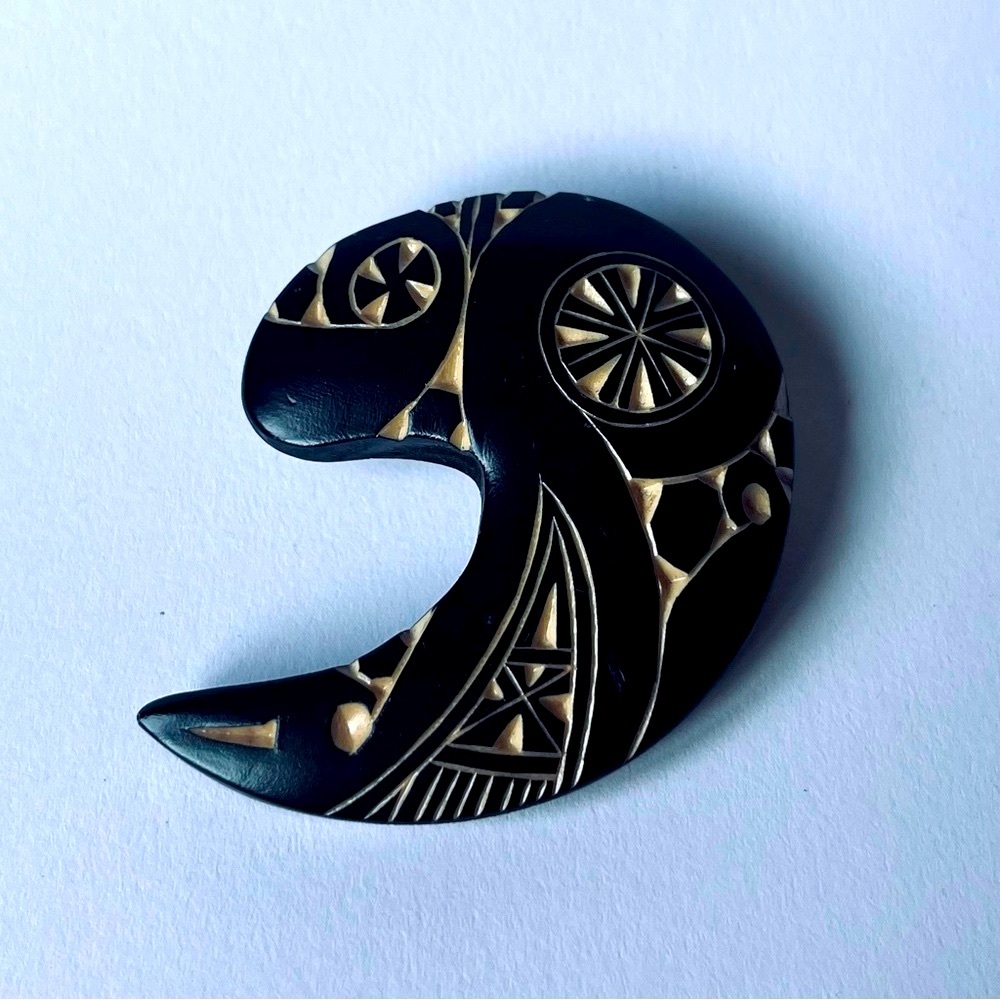 Hand carved traditional Ainu brooch